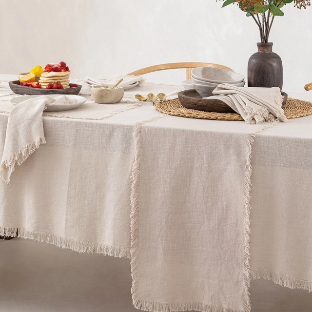 Ashra Fringed Beige Table Linen Range by M.U.S.E.