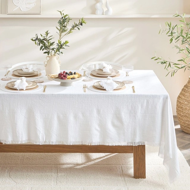 Ashra Fringed White Table Linen Range by M.U.S.E.